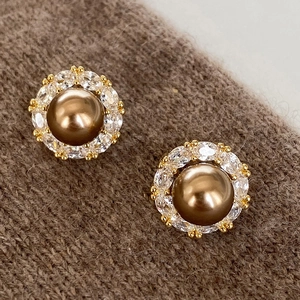 Elegant gold vintage stud earrings with brown pearl and shimmering zircon halo