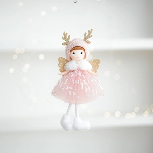 Detailed close-up of pink Christmas angel deer doll with sequins and knitting textures