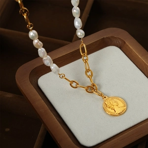 Vintage gold chain necklace with baroque pearls and embossed coin portrait pendant