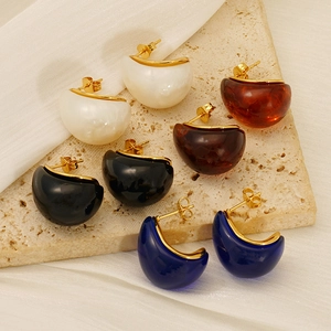 Detail view of retro water drop resin earrings with gold edges in four stylish colors
