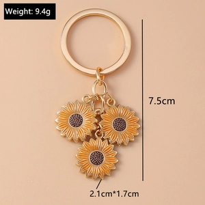 Detailed view of golden sunflower keychain with 9.4g weight and 7.5cm total length specs