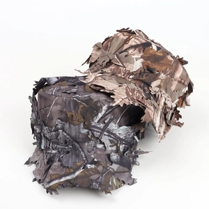 Detail of 3D leaf camouflage military hats showing realistic woodland forest texture