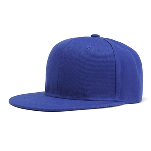 Detail view of navy blue flat brim hip hop cap showing six-panel crown and twill fabric texture