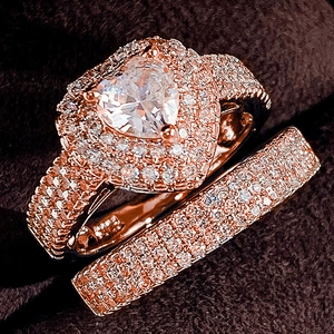 Luxury rose gold engagement ring set with heart-shaped zircon and sparkling pavé diamonds