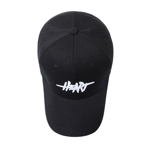 Classic black baseball cap with white HEART embroidery in fine 3D stitch on white backdrop