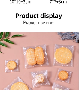 Detail view of white polka dot frosted self-adhesive bags in 7x7cm and 10x10cm sizes
