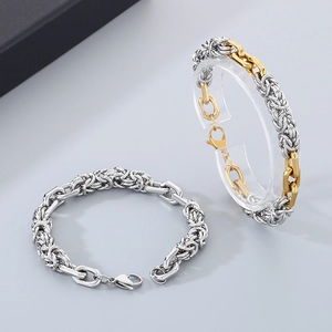 Bracelet chaîne byzantine et trombone en acier inoxydable poli tons argent et doré