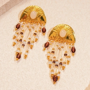Golden fan tassel earrings with cream gemstones and brown beaded fringe strands