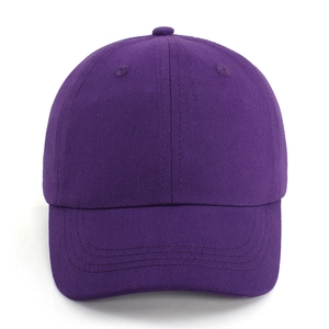Detailed texture of dark purple cotton twill kids baseball cap with six-panel construction