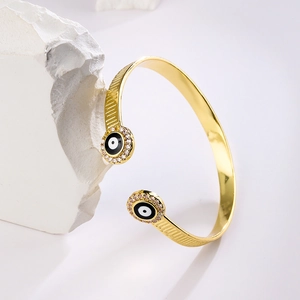 Minimalistisches 18K vergoldetes Evil Eye Armreif mit funkelnden Zirkonia-Akzenten