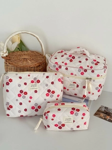 Dreiteiliges Blumen-Kosmetiktaschen-Set aus Cord mit Steppmuster und Tragegriff