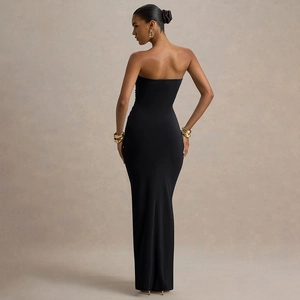 Rear view showing elegant ruched detailing on a black slim fit tube floor-length dress