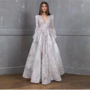Elegant white lace embroidery evening gown with deep V-neck and sequins for formal events