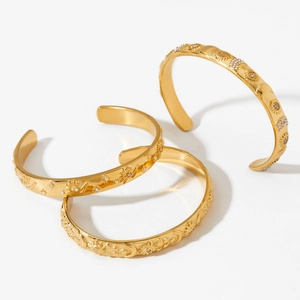 Three-piece gold-plated stainless steel cuff bracelets with celestial carvings and zircons