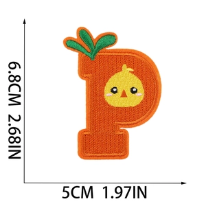 Detail view of orange letter P Easter patch with yellow chick and size measurements