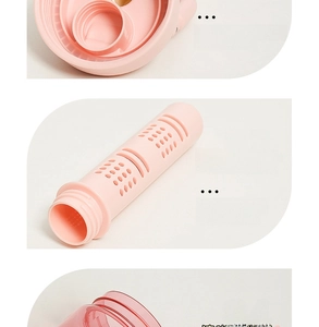 Detail of pink leak-proof lid with sealing ring and detachable tea filter for water bottle