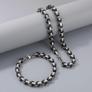 Detail of Byzantine style stainless steel necklace and bracelet set in silver and black