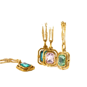 Vintage gold necklaces with colorful rectangular zircon pendants on white background