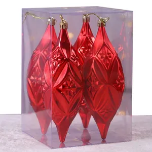 Lot de 4 boules de Noël rouges avec relief étoilé dans une boîte de présentation