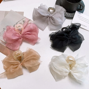 Elegant organza bow hair claws in five colors including grey, pink and black
