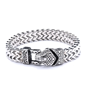 Detailed view of men's vintage snake head clasp on silver braided stainless steel bracelet