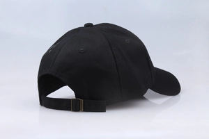 Detail view of cotton baseball cap featuring adjustable metal buckle and six-panel structure