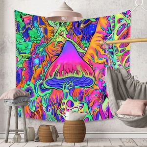 Detail of psychedelic mushroom tapestry with neon abstract patterns in a boho room