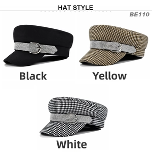 Detailed view of three newsboy hats in black, yellow, and houndstooth with rhinestone belts