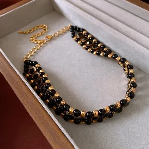 Vintage layered black and gold beaded necklace with crystals in jewelry display box