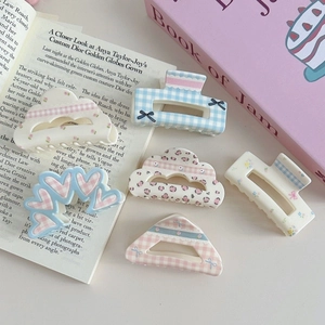 Floral and plaid patterned acrylic hair claws in assorted shapes for elegant hair styling