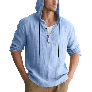 Detail view of men's light blue linen hoodie with drawstring and wood buttons