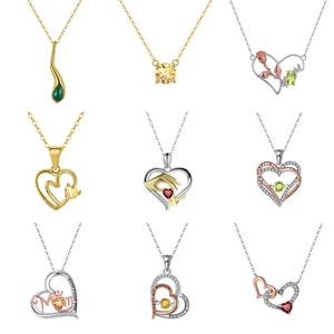 Detailed grid of silver heart necklaces with colorful zircons and Mom themed engravings
