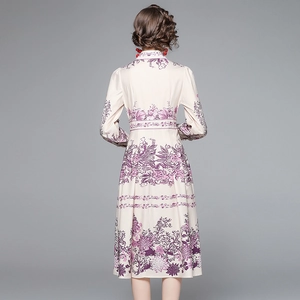 Elegant vintage ivory midi dress with purple floral print and long lantern sleeves