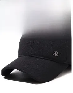 Close-up of winter wool baseball cap with metallic Z logo and thick twill texture