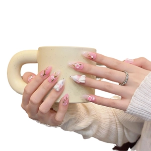 Pink gradient press-on nails with 3D embossed flowers and rabbit designs for women