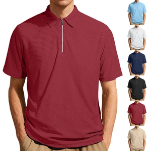 Detailed view of men's polo shirt texture showing six diverse color options and zipper