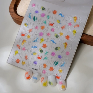 Detailed macro view of 5D ocean life nail stickers with starfish and whale motifs