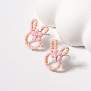 Sweet pink bunny stud earrings with small beads and delicate white imitation pearl accents