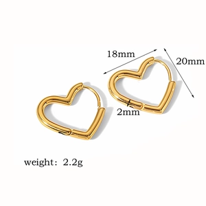 Detail view of 18K gold heart earrings showing 18mm diameter and 20mm height dimensions