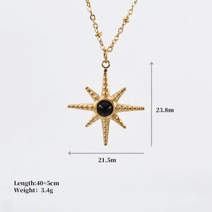 Detail view of gold star compass necklace showing 23.8mm pendant size and dimensions