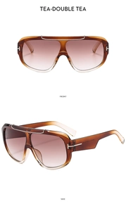 Detail view of oversized gradient tea sunglasses with silver metal T-shaped temples