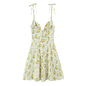 Detail of adjustable tie straps and V-neckline on floral print poplin summer dress
