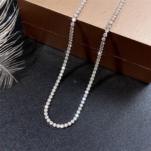 Elegant AAA zircon tennis necklace on premium jewelry box with a white feather accent