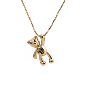 Minimalistische goldene Halskette mit süßem Bärenanhänger und schwarzen Zirkonia-Akzenten