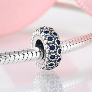 925 sterling silver flower charm with blue cubic zirconia on silver snake chain bracelet