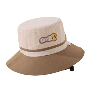 Kids' bucket hat with smiley embroidery in beige and brown color-blocking design