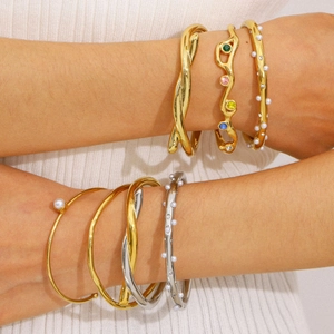 18K gold plated stainless steel bracelets with colorful zircons on a female model