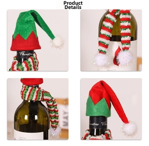 Close-up of mini Christmas plaid hats and striped knit scarves for wine bottle decoration