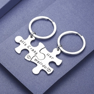Portachiavi per coppia a puzzle in acciaio inox con incisione His Crazy e Her Weirdo