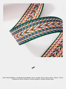 Detail of 3.8cm wide woven geometric pattern strap with premium leather ends